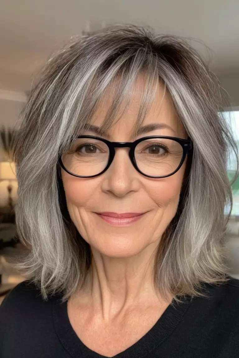 A photo of a 51-year-old Karen with glasses, Wispy Lob With Layers, Front view, living room background