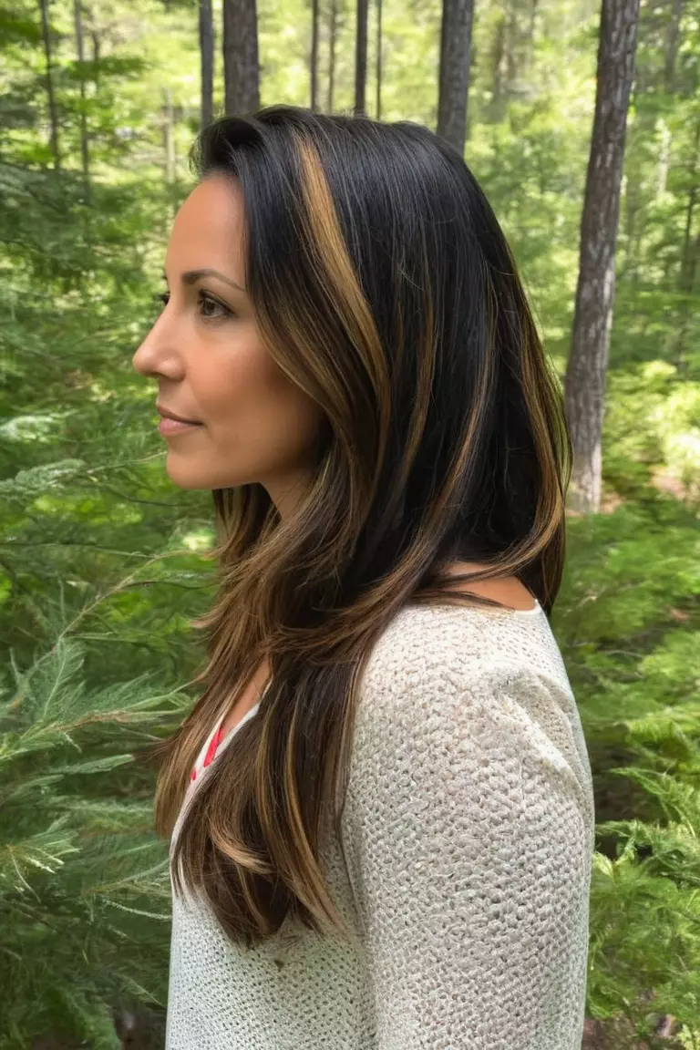 Caramel Blonde Highlights A photo of a 38-year-old Emily, Dark hair with Caramel Blonde Highlights, Side view, summer forest background