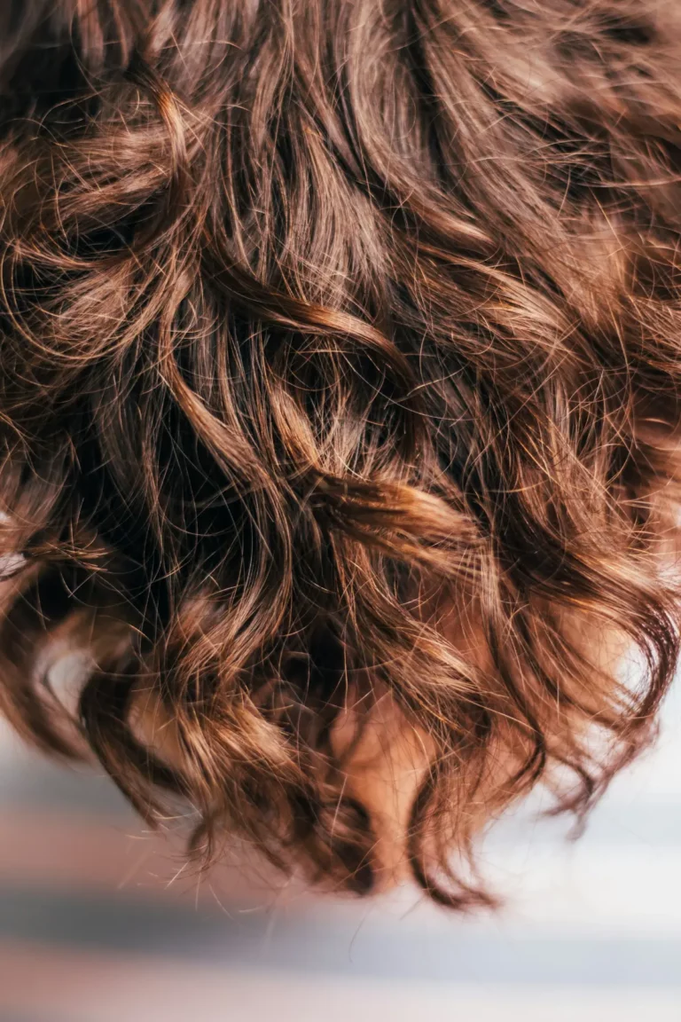 Why Does My Hair Dry Frizzy and Poofy? (Causes & Solutions)