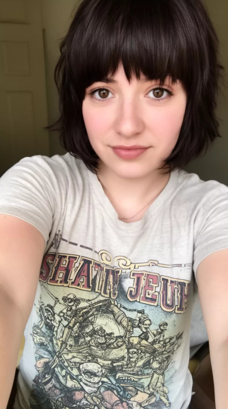 selfie of a 23-year-old woman wearing a vintage graphic tee with a Short Shag