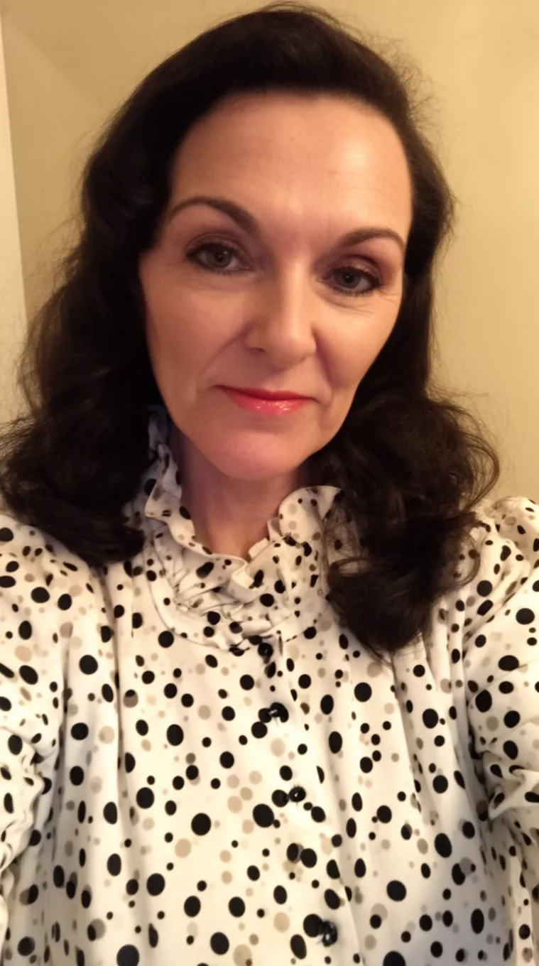 selfie of a 39-year-old woman wearing a polka-dot vintage blouse with Flipped Ends